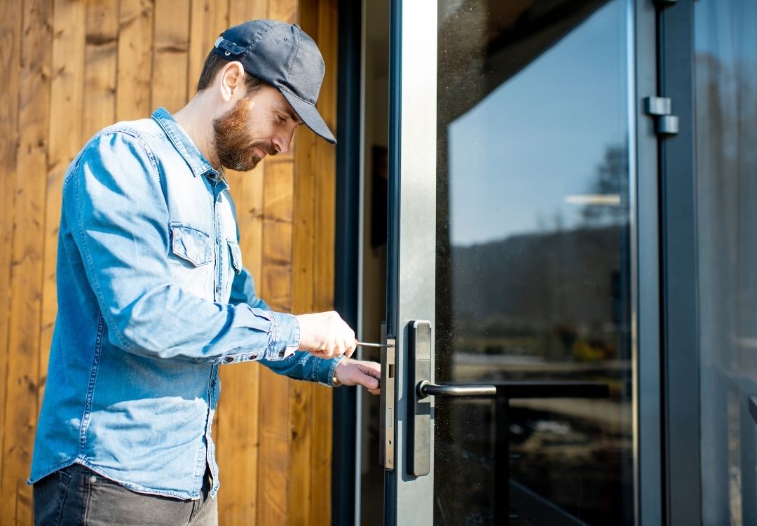 locksmith working on a door