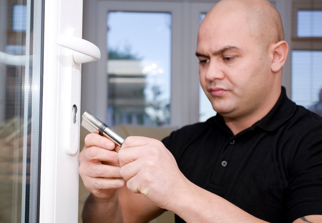 locksmith working on a door