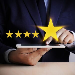 person tapping the five stars