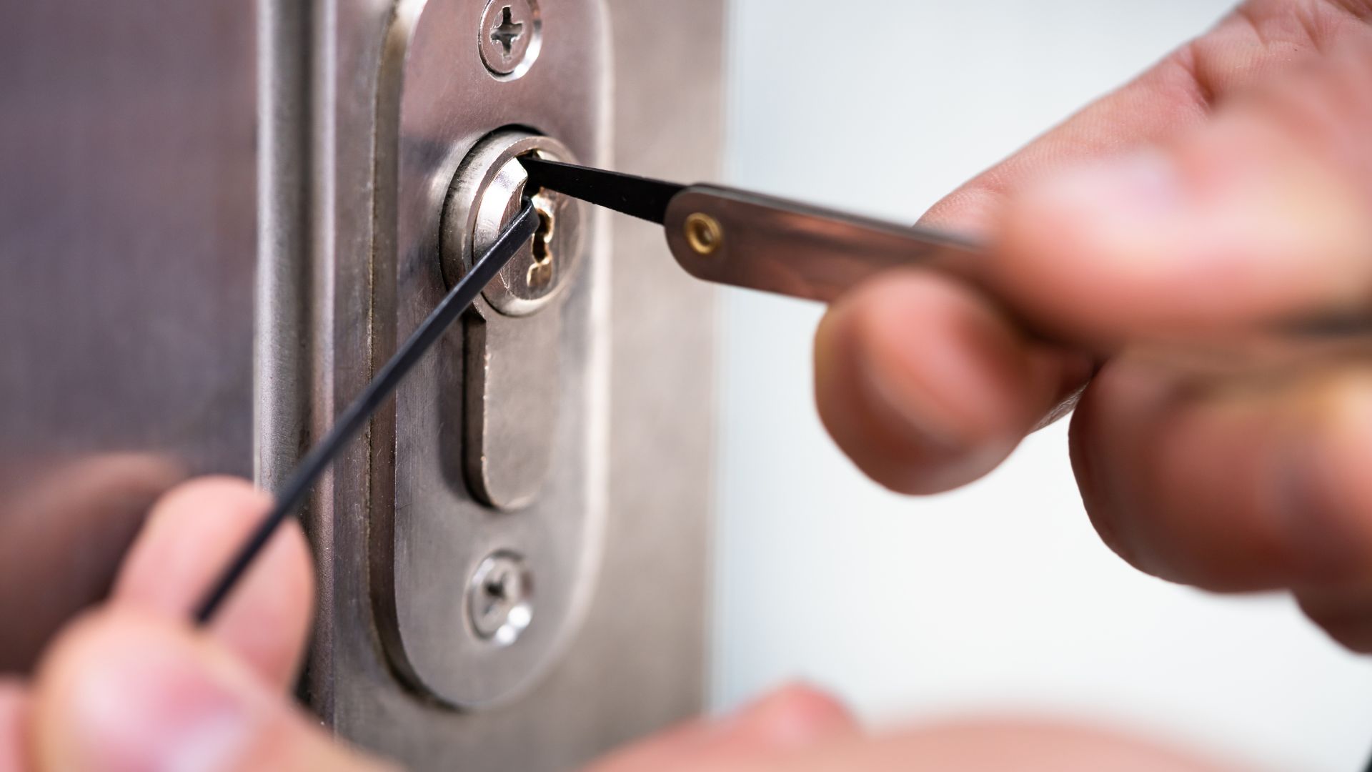 a locksmith working on a lock
